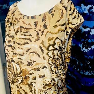 Beautiful Leopard kneelength dress with waist sash and cap sleeves. Nearly New